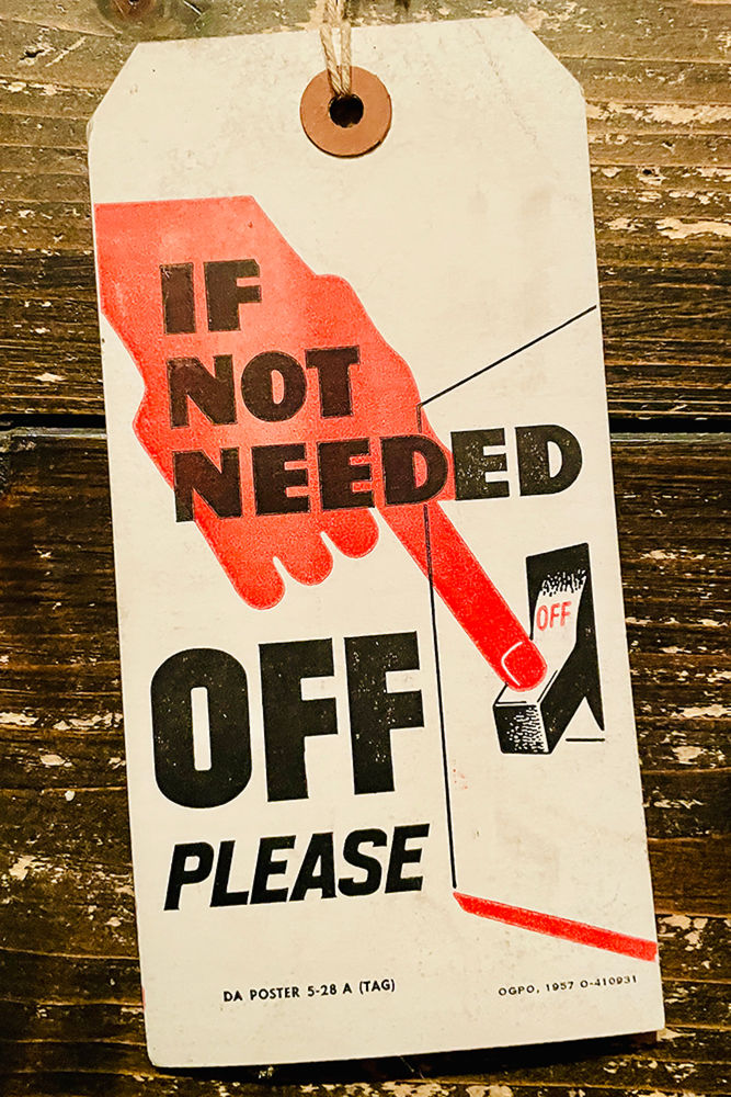 military instruction tag 1957 on wooden ground